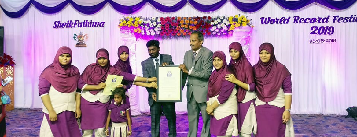 Indian Book of Records certificate presented to a group during a World Record Festival ceremony